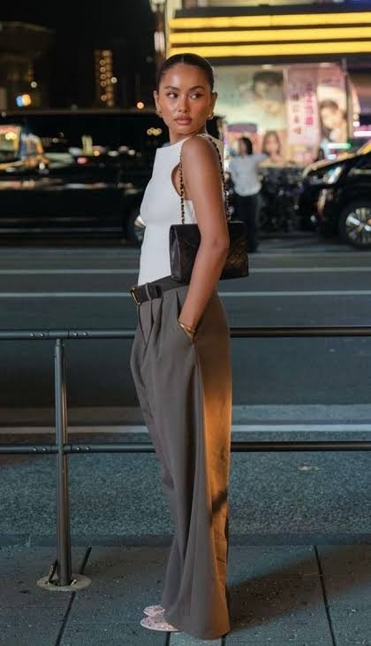 Chic washed black bottoms for streetwear | Chic dark wash pants for streetwear, Minimal glam outfit, Minimal luxe sleeveless top